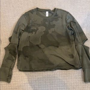 Green cropped pullover with elbow cutouts